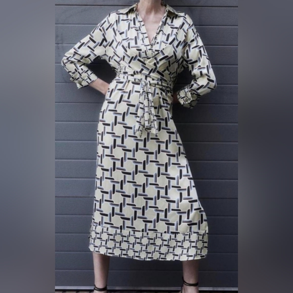 Elegant Black and Cream Patterned Dress